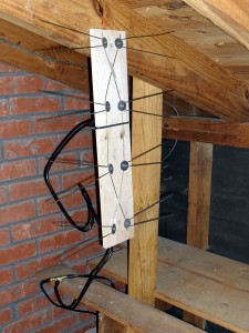 antenna screwed to rafter in attic