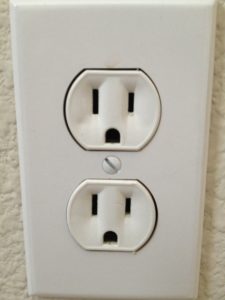 How do I charge my EV from this weird outlet I found in my garage?