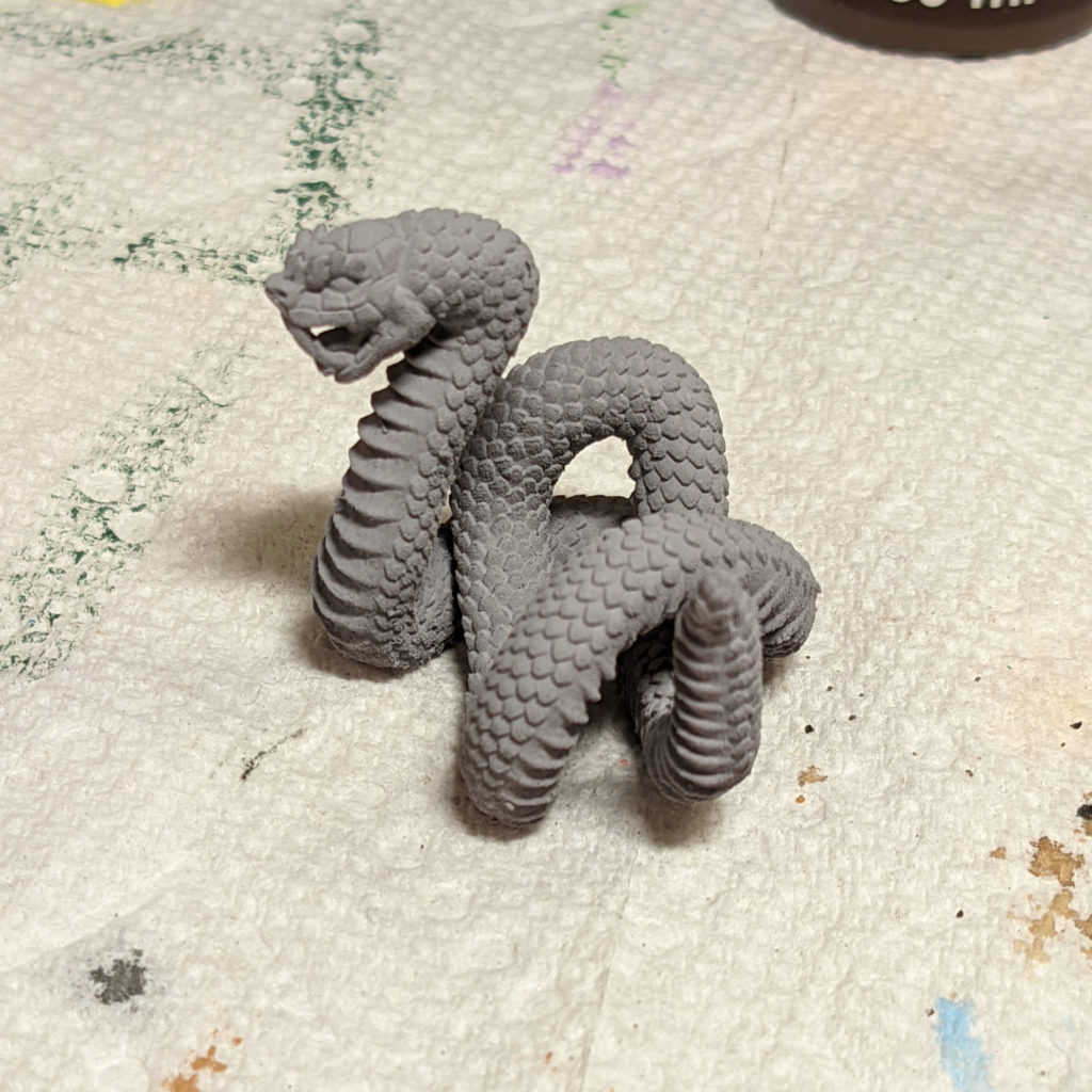 Snake model, with gray primer