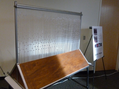 Wood and Aluminum frame with sixty square tubes.